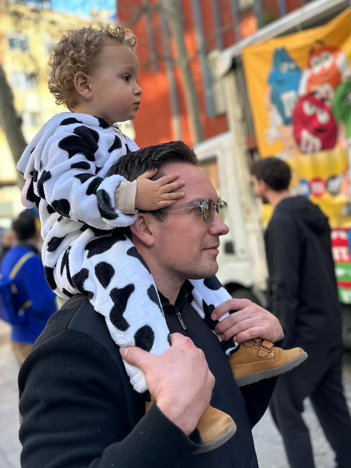 Felix Steinhauser carrying his son on his shoulders